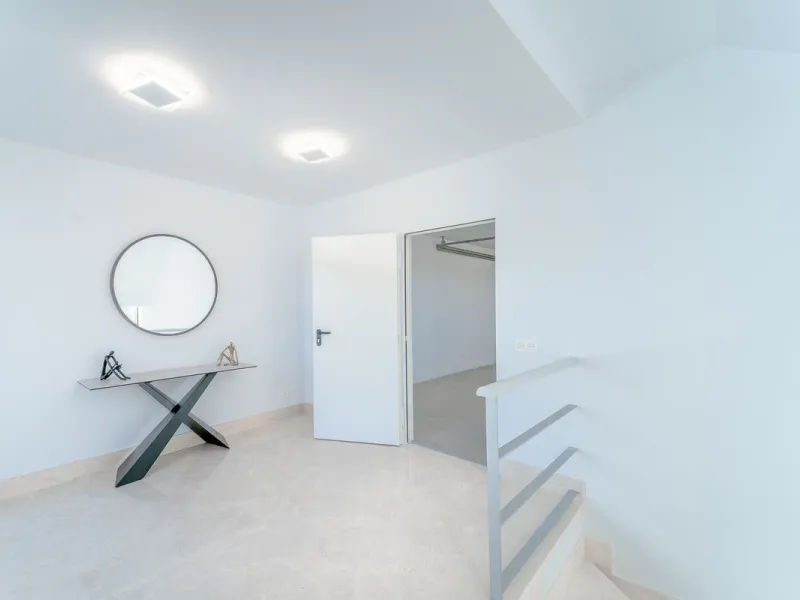 Newly built contemporary villa, finished on two floors plus basement, plus roof top, accessible by stairs and elevator. It is located in a natural environment, surrounded by golf and mountain, providing nice open views to those, panoramic sea view from th