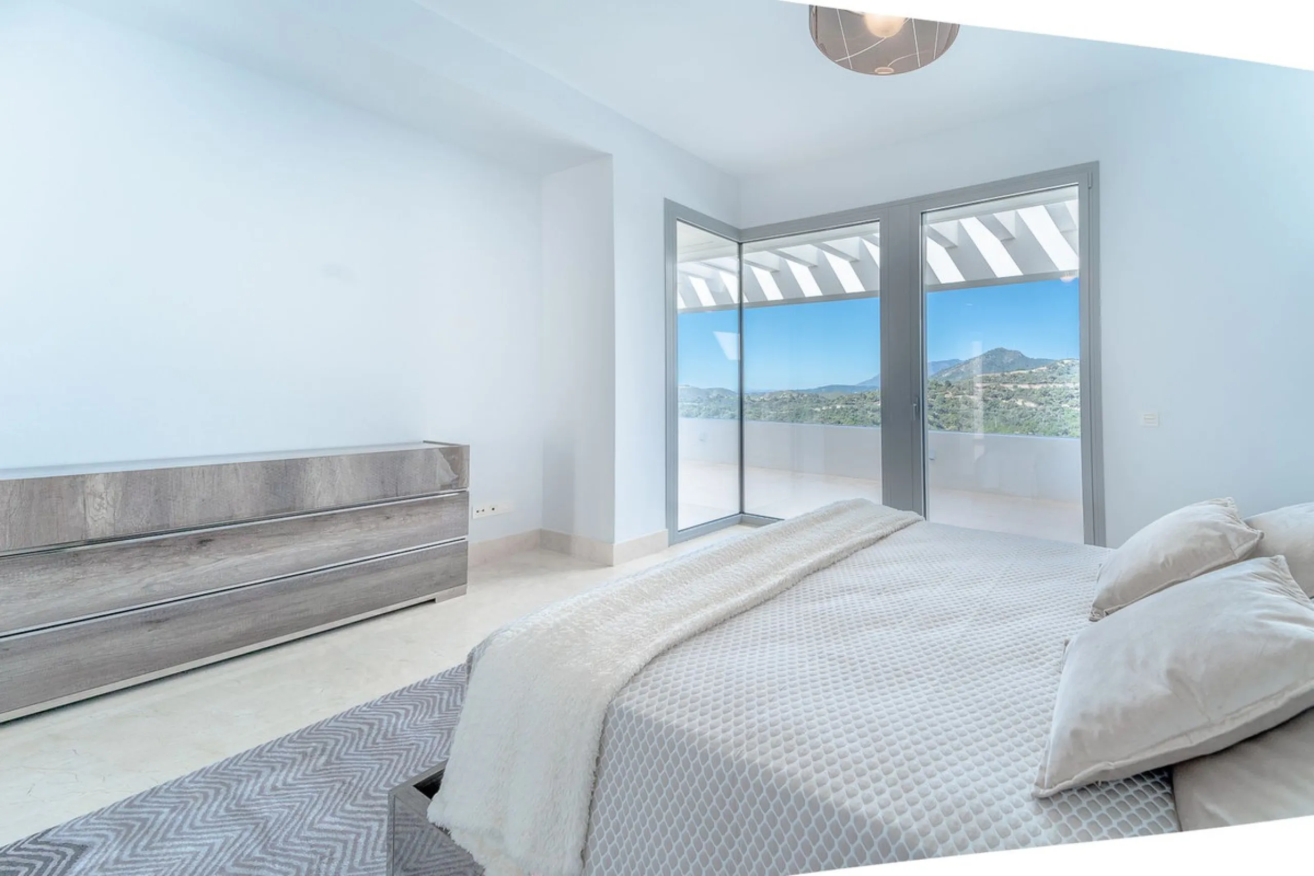 Newly built contemporary villa, finished on two floors plus basement, plus roof top, accessible by stairs and elevator. It is located in a natural environment, surrounded by golf and mountain, providing nice open views to those, panoramic sea view from th