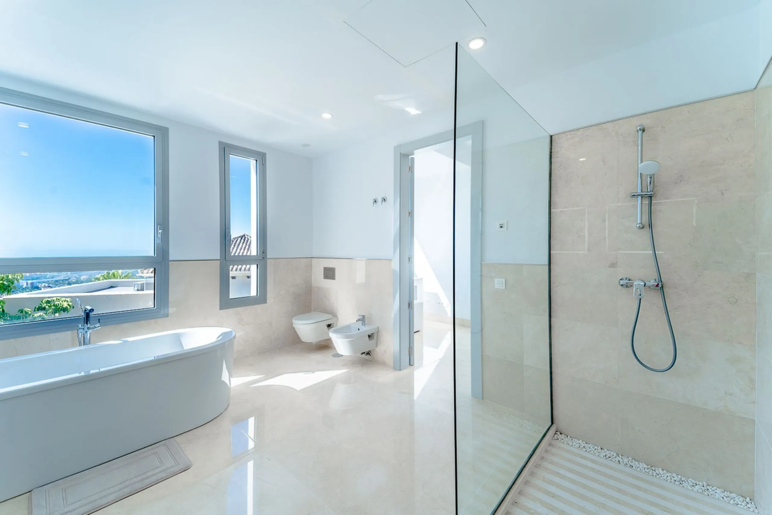 Newly built contemporary villa, finished on two floors plus basement, plus roof top, accessible by stairs and elevator. It is located in a natural environment, surrounded by golf and mountain, providing nice open views to those, panoramic sea view from th