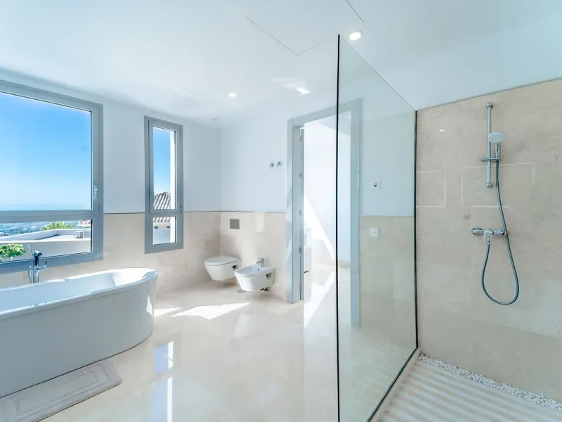 Newly built contemporary villa, finished on two floors plus basement, plus roof top, accessible by stairs and elevator. It is located in a natural environment, surrounded by golf and mountain, providing nice open views to those, panoramic sea view from th