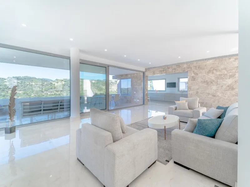Newly built contemporary villa, finished on two floors plus basement, plus roof top, accessible by stairs and elevator. It is located in a natural environment, surrounded by golf and mountain, providing nice open views to those, panoramic sea view from th