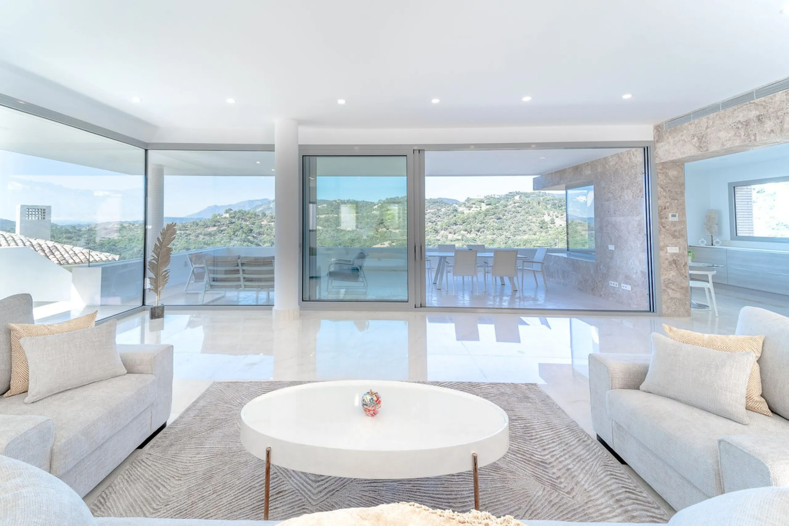 Newly built contemporary villa, finished on two floors plus basement, plus roof top, accessible by stairs and elevator. It is located in a natural environment, surrounded by golf and mountain, providing nice open views to those, panoramic sea view from th