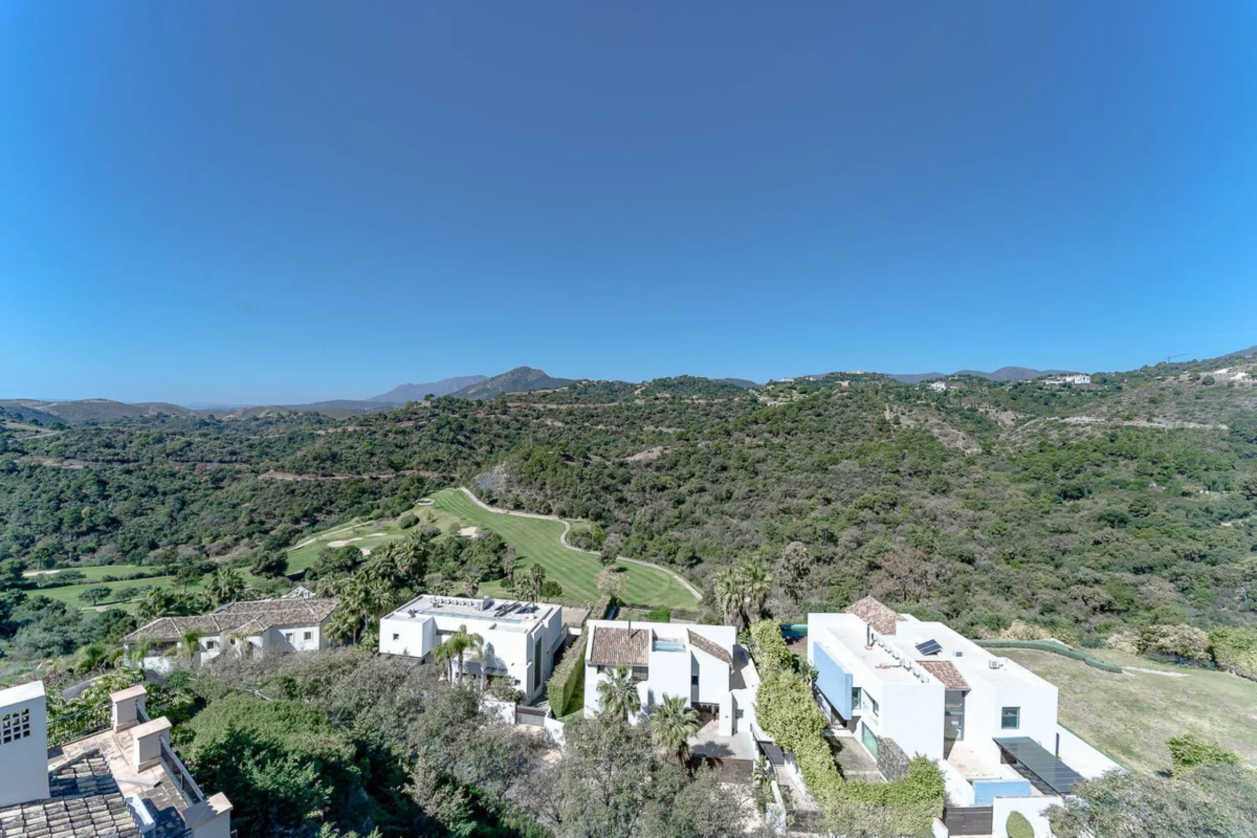 Newly built contemporary villa, finished on two floors plus basement, plus roof top, accessible by stairs and elevator. It is located in a natural environment, surrounded by golf and mountain, providing nice open views to those, panoramic sea view from th