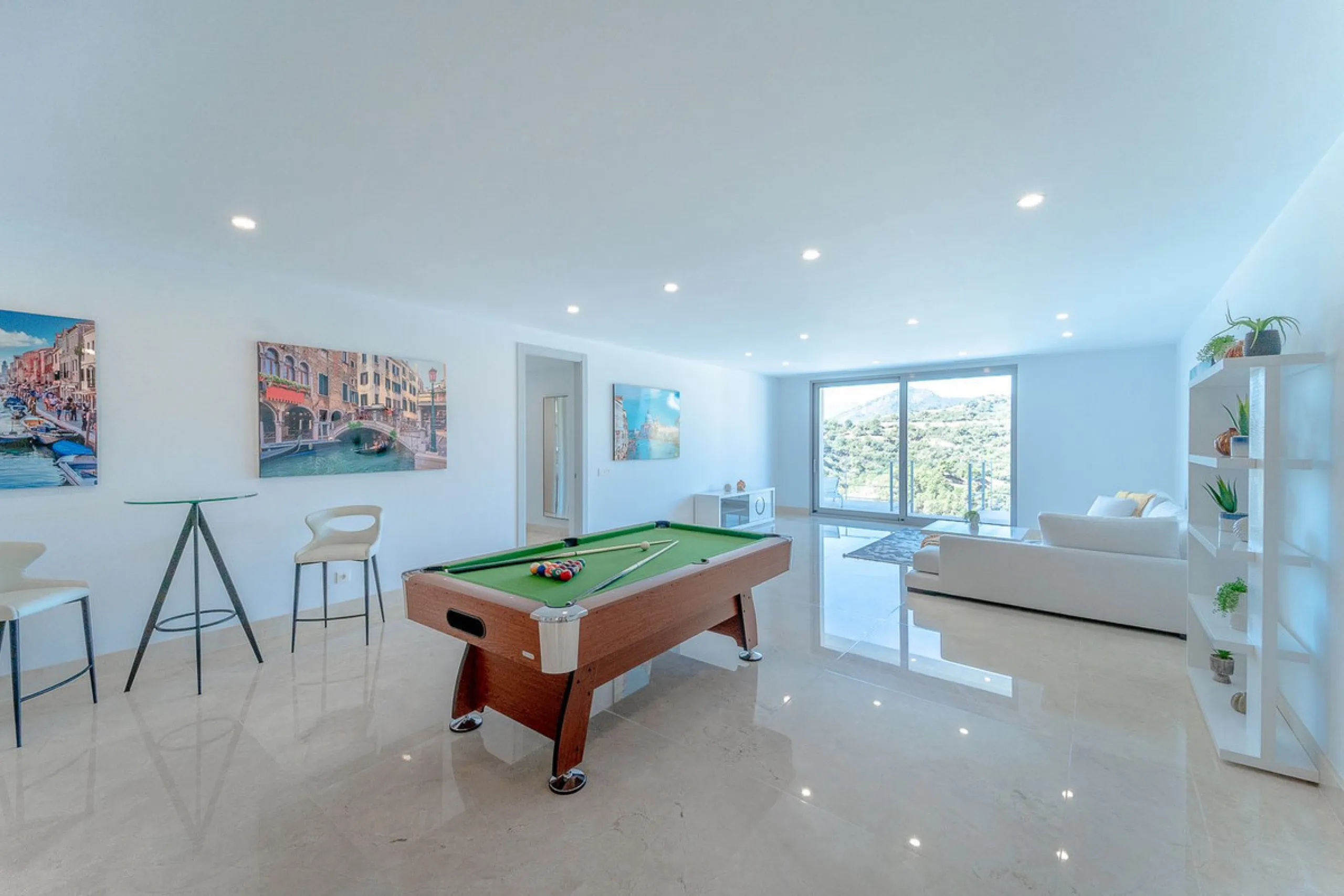 Newly built contemporary villa, finished on two floors plus basement, plus roof top, accessible by stairs and elevator. It is located in a natural environment, surrounded by golf and mountain, providing nice open views to those, panoramic sea view from th