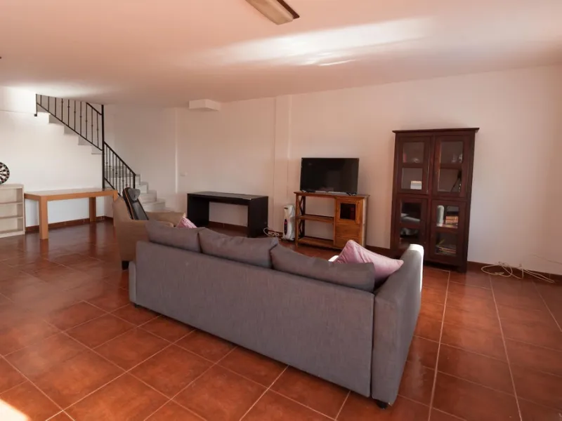 GREAT OPPORTUNITY! Bright and spacious house located in the sought after area of Puerto Blanquillo in Frigiliana, with un interrupted views over the valley towards Nerja and the Mediterranean Sea. The house is on a corner plot and has two independent entr