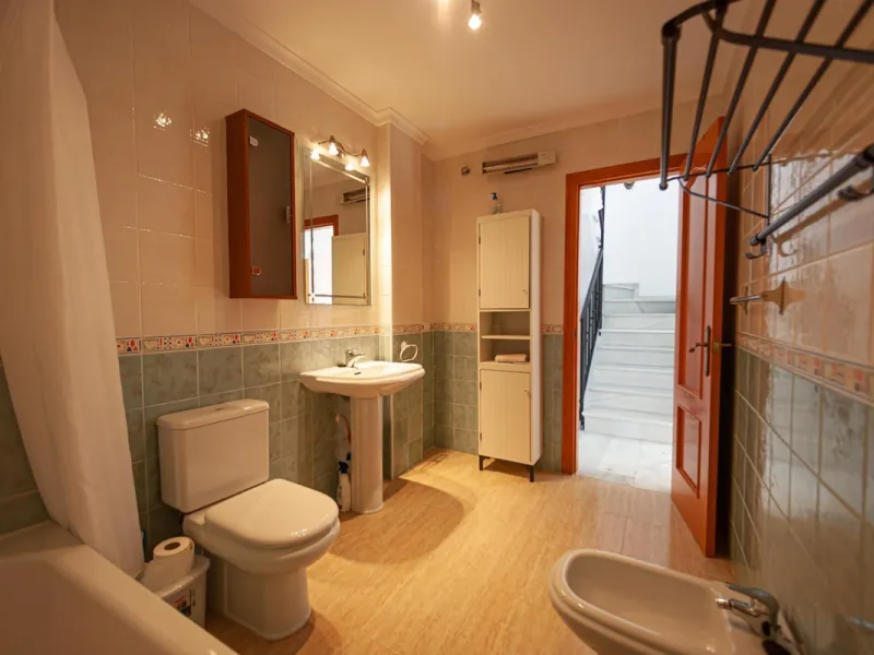 GREAT OPPORTUNITY! Bright and spacious house located in the sought after area of Puerto Blanquillo in Frigiliana, with un interrupted views over the valley towards Nerja and the Mediterranean Sea. The house is on a corner plot and has two independent entr