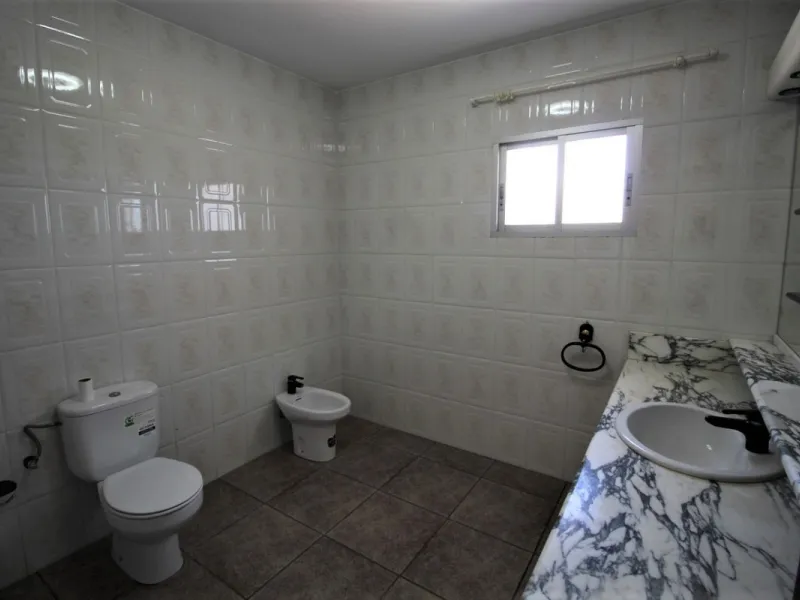 Beautiful 8000 sq. mts. farmhouse near the town of Rubite. The house has a covered terrace, three bedrooms, one bathroom, a lounge with fireplace, kitchen and a garage. Outside, on the upper part of the plot, there is a large swimming pool, a chicken coop