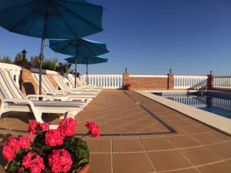 Nestled in the serene and sought-after community of Cortijos San Rafael, just off the Frigiliana road near Nerja, this outstanding detached villa—completed in 2008—offers an exceptional standard of living with stunning panoramic views of both the sea and 