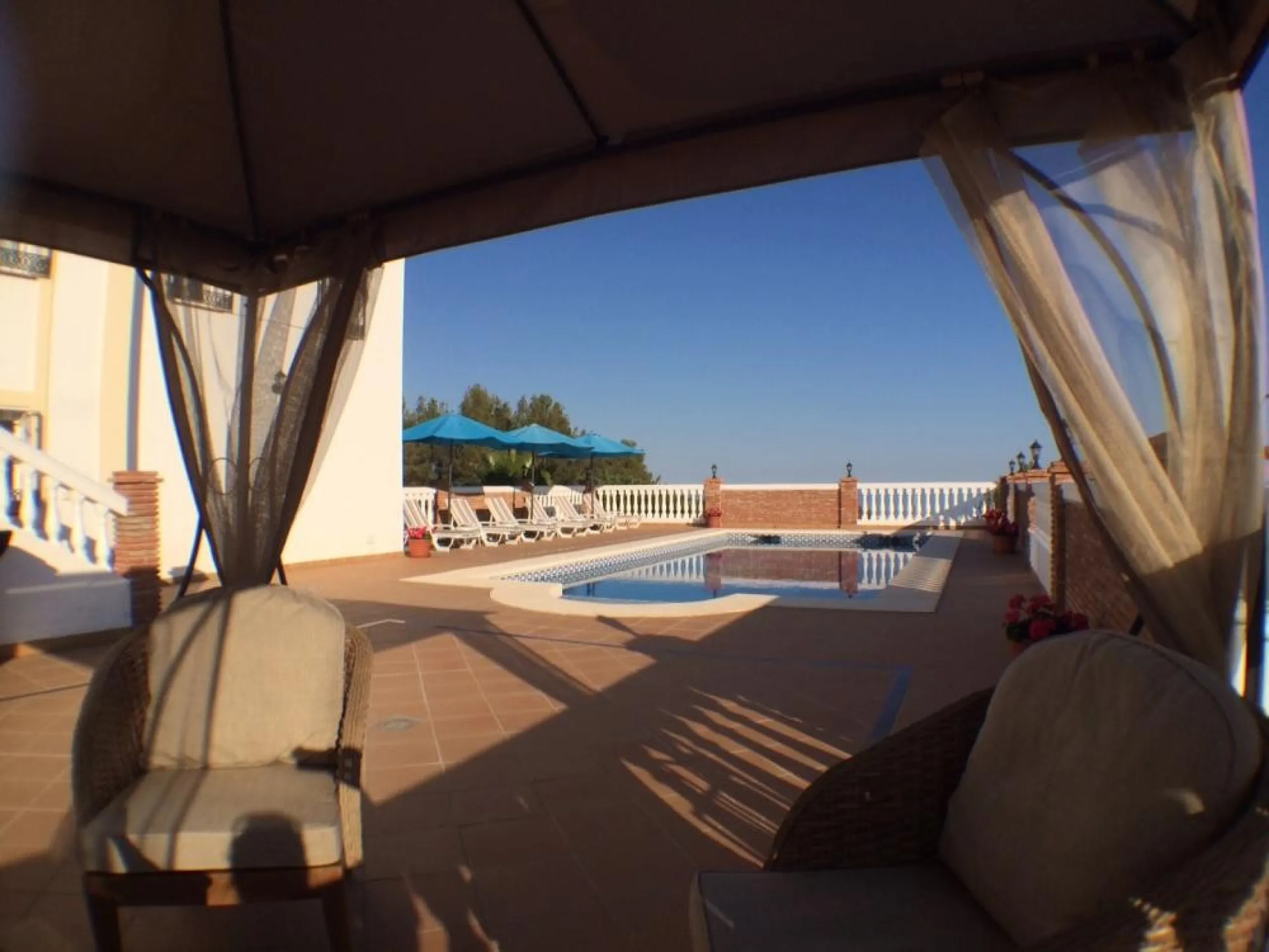 Nestled in the serene and sought-after community of Cortijos San Rafael, just off the Frigiliana road near Nerja, this outstanding detached villa—completed in 2008—offers an exceptional standard of living with stunning panoramic views of both the sea and 