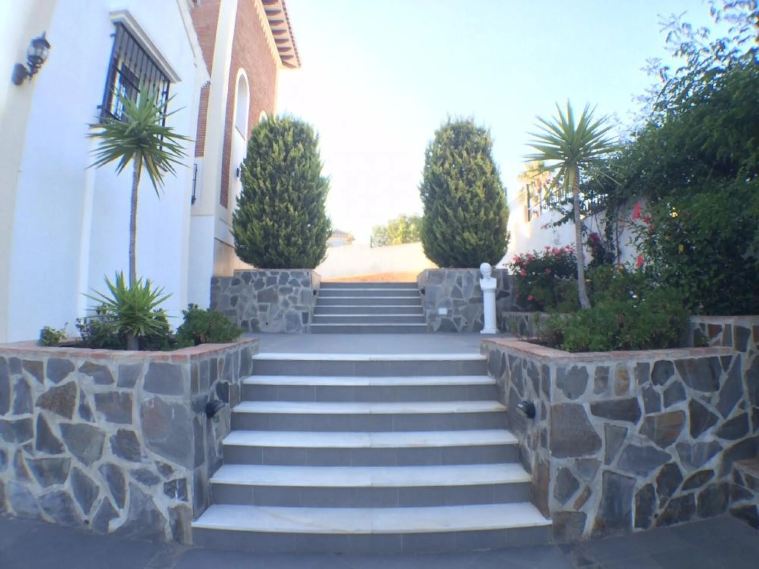Nestled in the serene and sought-after community of Cortijos San Rafael, just off the Frigiliana road near Nerja, this outstanding detached villa—completed in 2008—offers an exceptional standard of living with stunning panoramic views of both the sea and 
