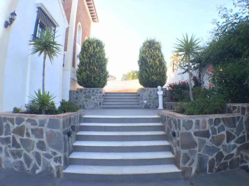 Nestled in the serene and sought-after community of Cortijos San Rafael, just off the Frigiliana road near Nerja, this outstanding detached villa—completed in 2008—offers an exceptional standard of living with stunning panoramic views of both the sea and 