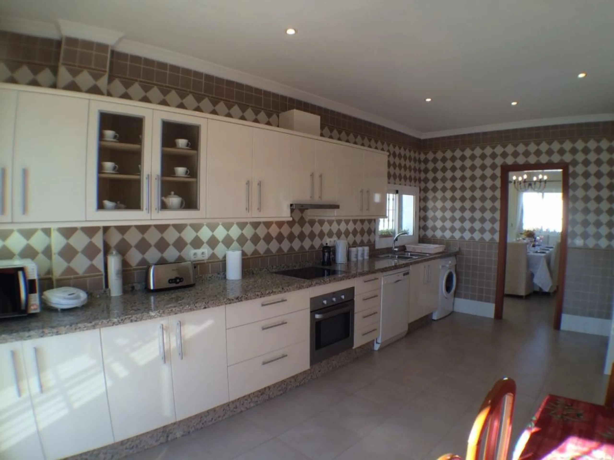 Nestled in the serene and sought-after community of Cortijos San Rafael, just off the Frigiliana road near Nerja, this outstanding detached villa—completed in 2008—offers an exceptional standard of living with stunning panoramic views of both the sea and 