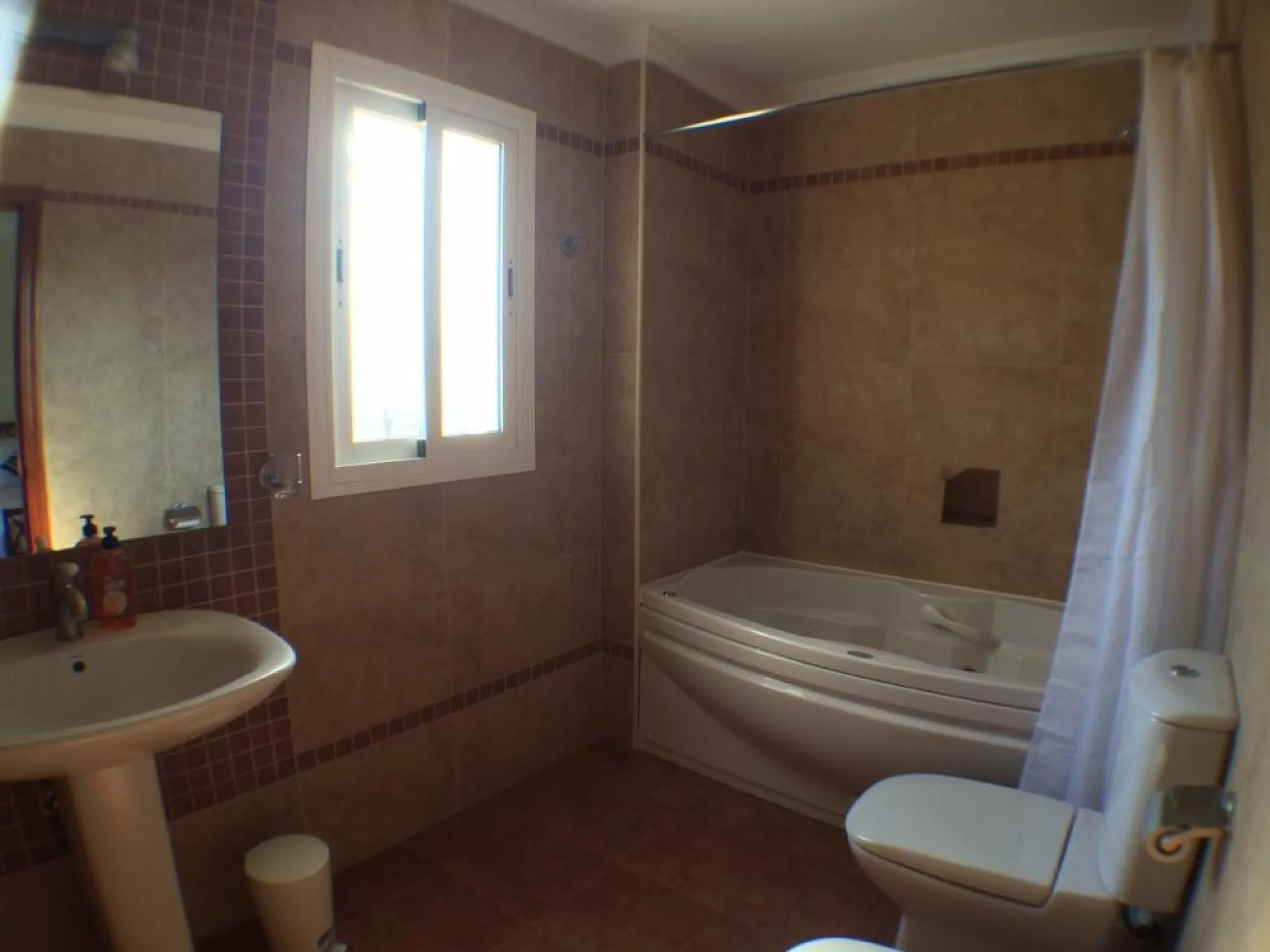 Nestled in the serene and sought-after community of Cortijos San Rafael, just off the Frigiliana road near Nerja, this outstanding detached villa—completed in 2008—offers an exceptional standard of living with stunning panoramic views of both the sea and 