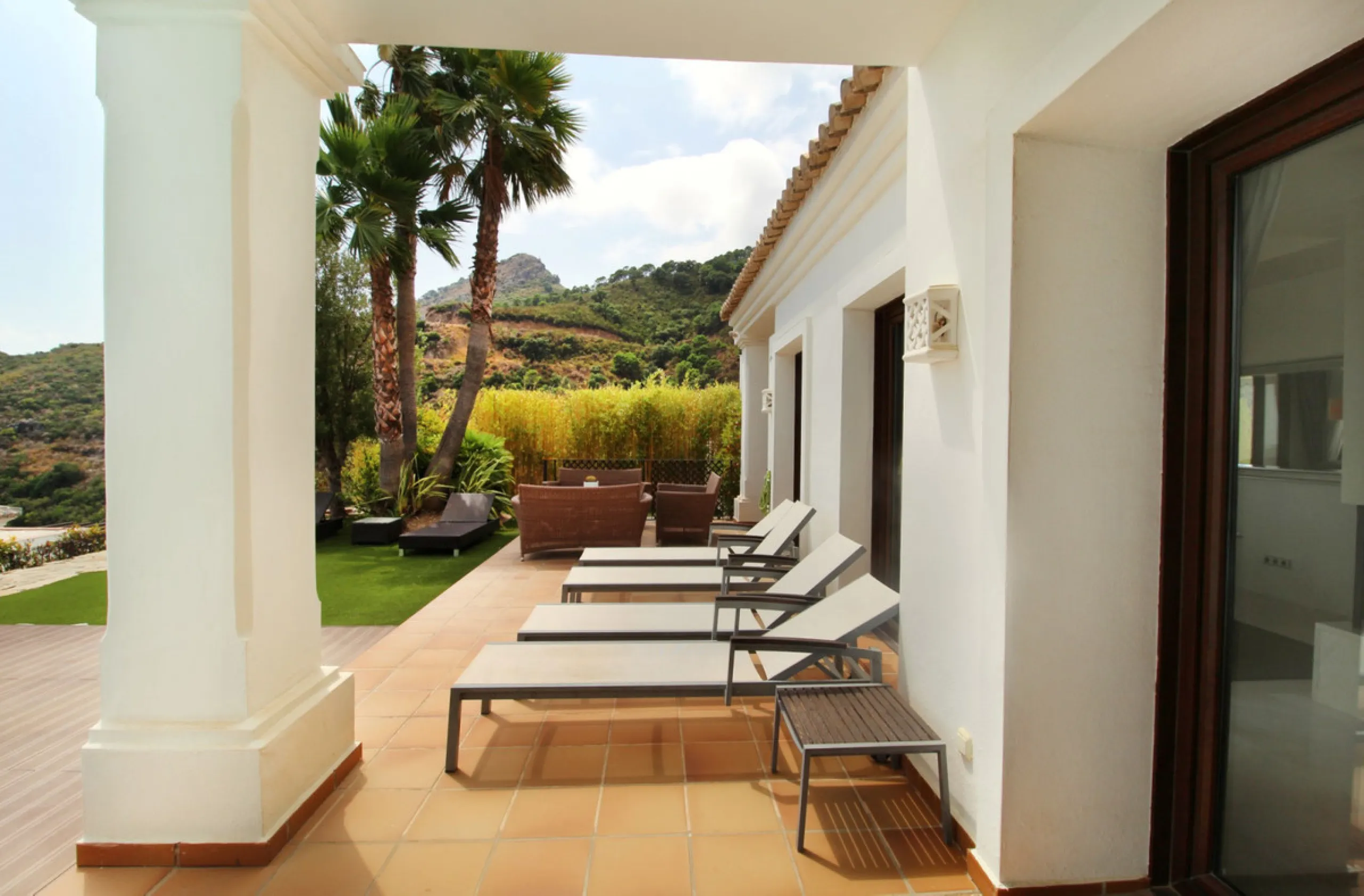 Situated on a gated community just a short walk from the beautiful village of Benahavis and all its famous restaurants, and just seven kilometres inland from the glamourous coastal hotspots of Puerto Banus and Marbella lies this contemporary south facing 