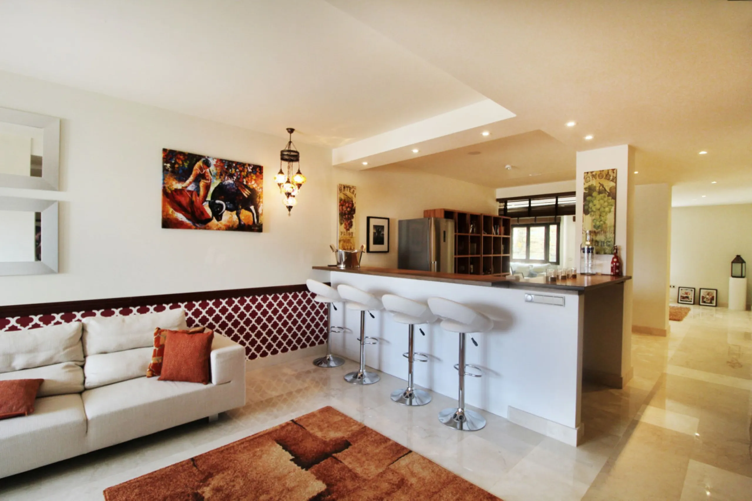 Situated on a gated community just a short walk from the beautiful village of Benahavis and all its famous restaurants, and just seven kilometres inland from the glamourous coastal hotspots of Puerto Banus and Marbella lies this contemporary south facing 