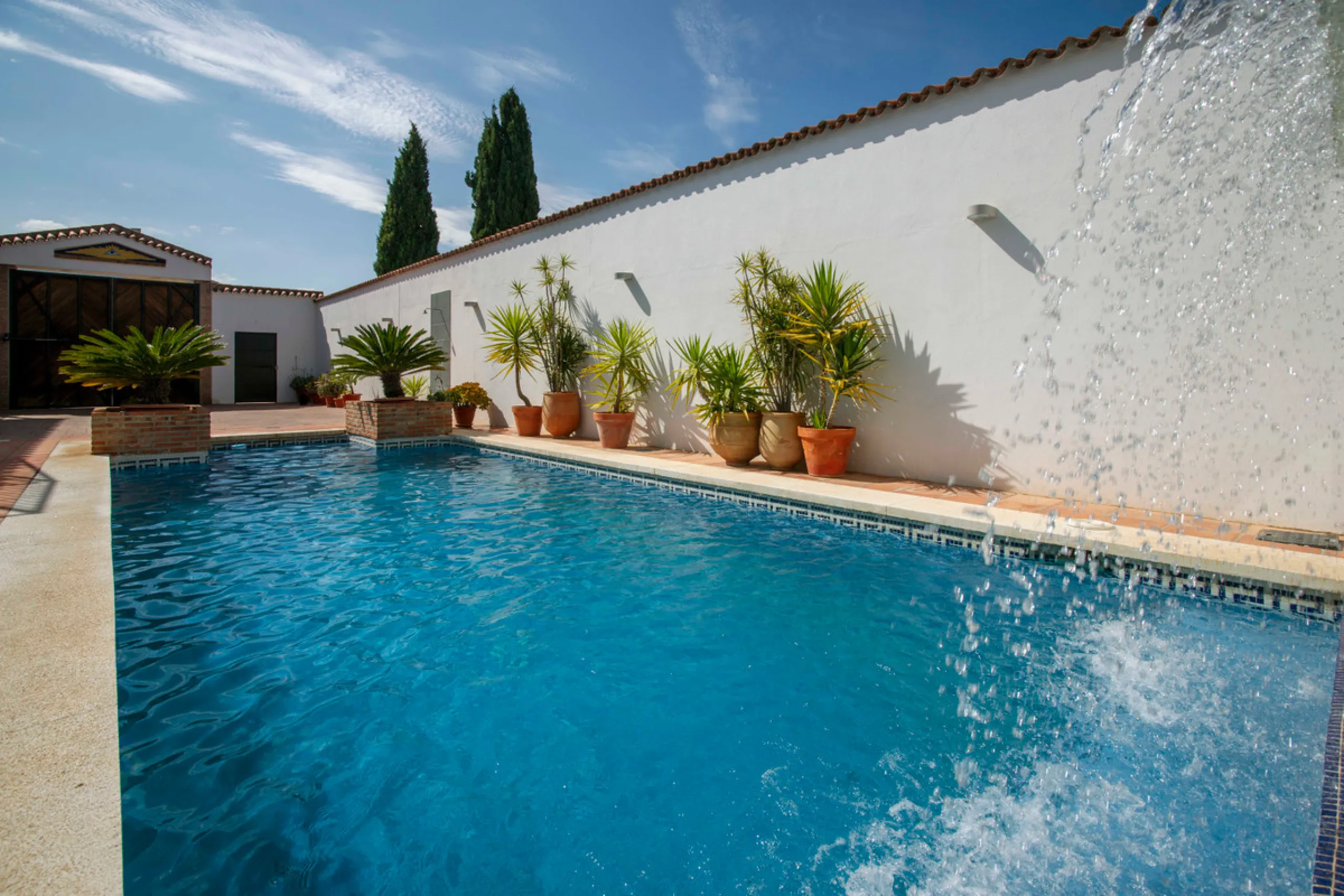 This large village property has been completely rebuild and converted into the most sublime rural tourism establishment. Currently boasting six en-suite letting rooms, the property has staff accommodation and spaces.A fantastic kitchen to run a high quali