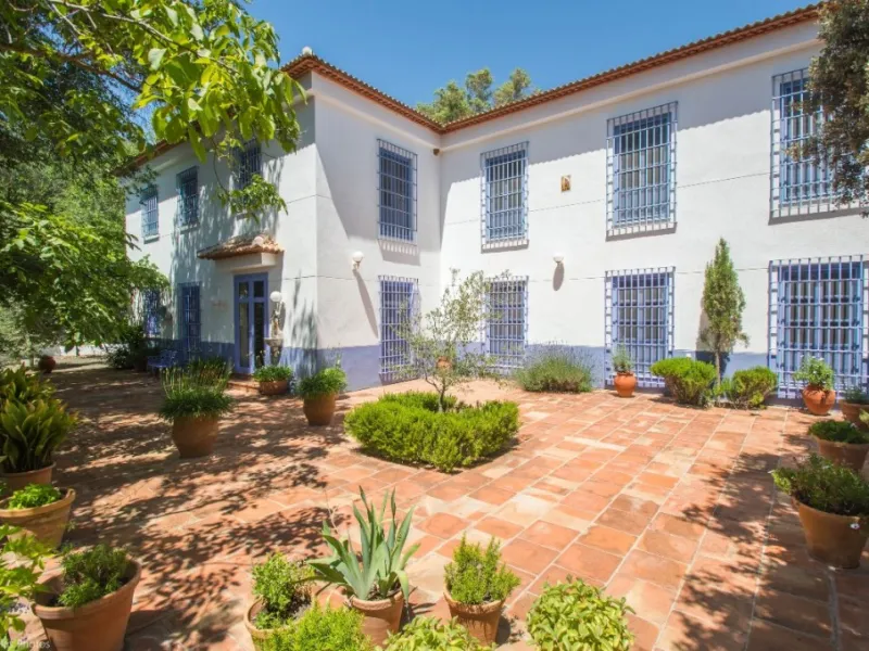 Fantastically Elegant Finca Between Archidona and Villanueva de Tapia, which is Totally Fenced/ Walled. The Finca and Dwelling Feature Total Privacy, and Yet is Only Four minutes from the Motorway and Equidistant between Malaga and Granada Airports..