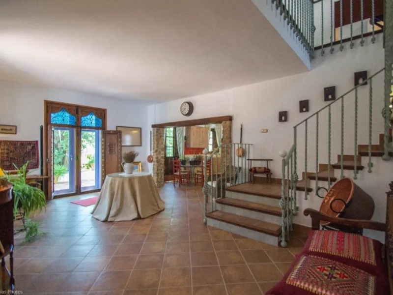 Fantastically Elegant Finca Between Archidona and Villanueva de Tapia, which is Totally Fenced/ Walled. The Finca and Dwelling Feature Total Privacy, and Yet is Only Four minutes from the Motorway and Equidistant between Malaga and Granada Airports..
