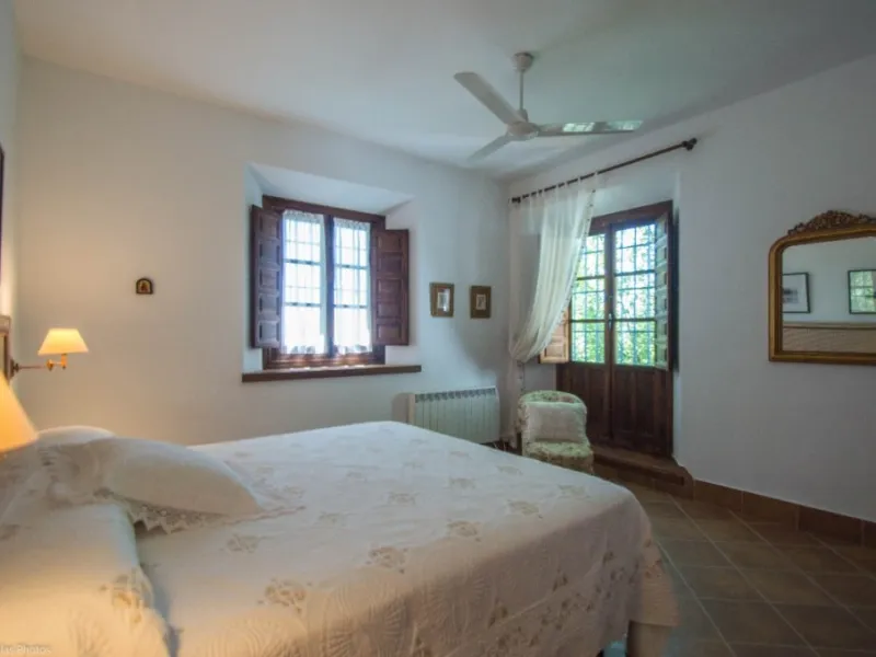 Fantastically Elegant Finca Between Archidona and Villanueva de Tapia, which is Totally Fenced/ Walled. The Finca and Dwelling Feature Total Privacy, and Yet is Only Four minutes from the Motorway and Equidistant between Malaga and Granada Airports..
