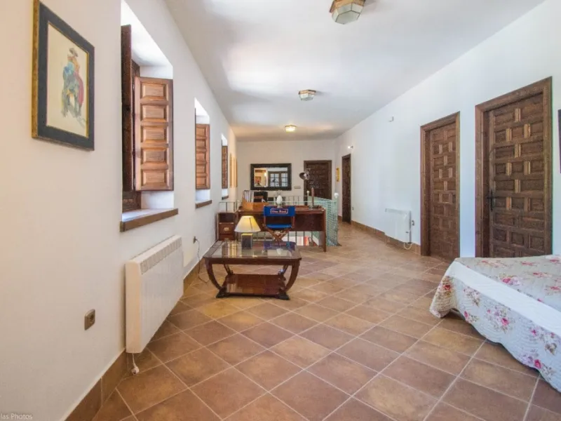 Fantastically Elegant Finca Between Archidona and Villanueva de Tapia, which is Totally Fenced/ Walled. The Finca and Dwelling Feature Total Privacy, and Yet is Only Four minutes from the Motorway and Equidistant between Malaga and Granada Airports..