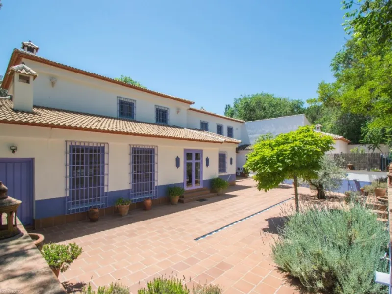 Fantastically Elegant Finca Between Archidona and Villanueva de Tapia, which is Totally Fenced/ Walled. The Finca and Dwelling Feature Total Privacy, and Yet is Only Four minutes from the Motorway and Equidistant between Malaga and Granada Airports..