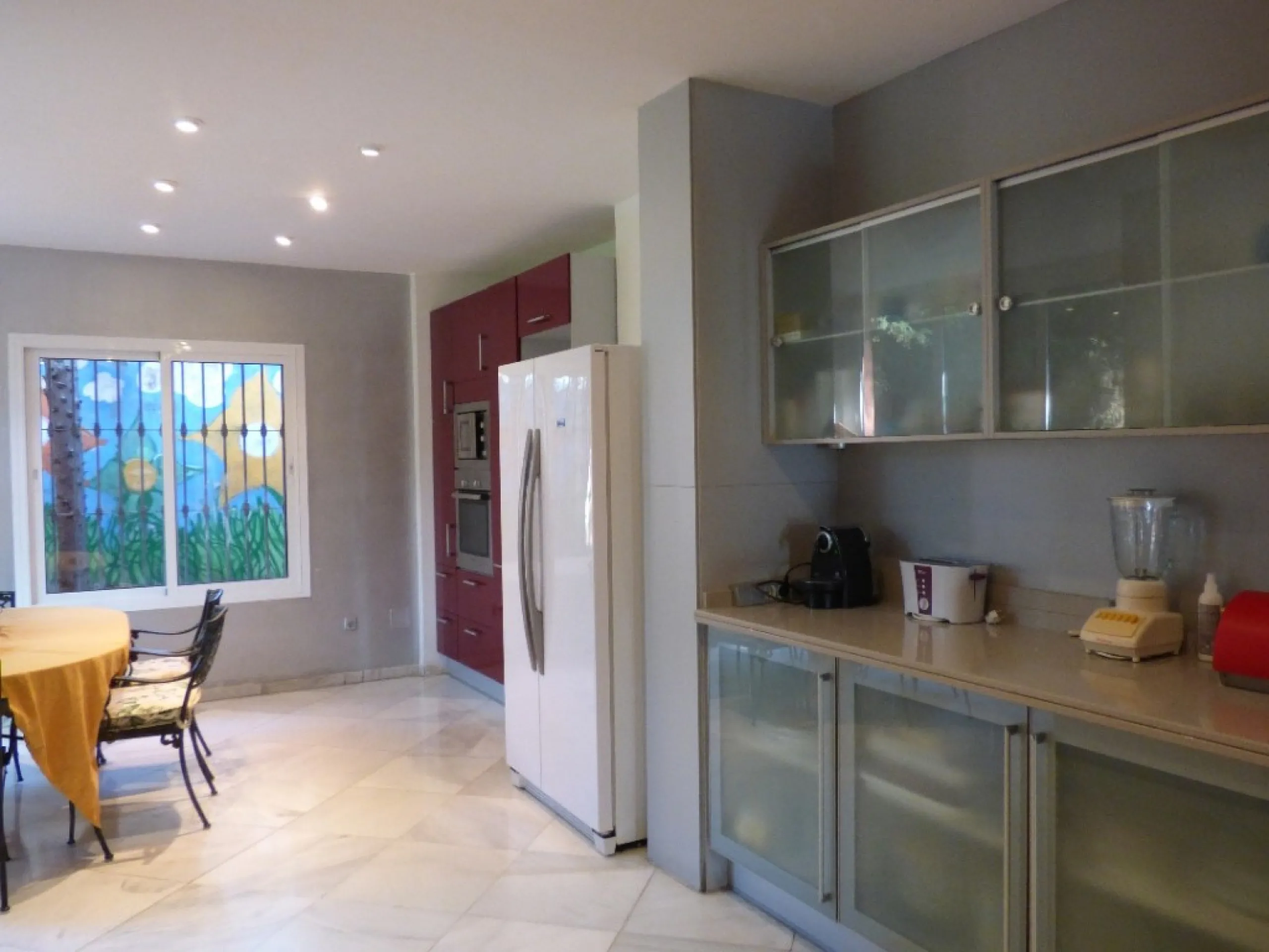 THE LARGEST HOUSE IN TORRENUEVA IN MIJAS AT WALKING DISTANCE TO THE BEACH AND TO THE MOST POPULAR VILLAGE OF LA CALA WHERE YOU FIND SUPERMARKETS, BARS, SHOPS, RESTAURANTS ETC. THE ROOMS ARE ALL VERY SPACIOUS ON THE MAINFLOOR THERE ARE 3 LIVING ROOMS TWO S