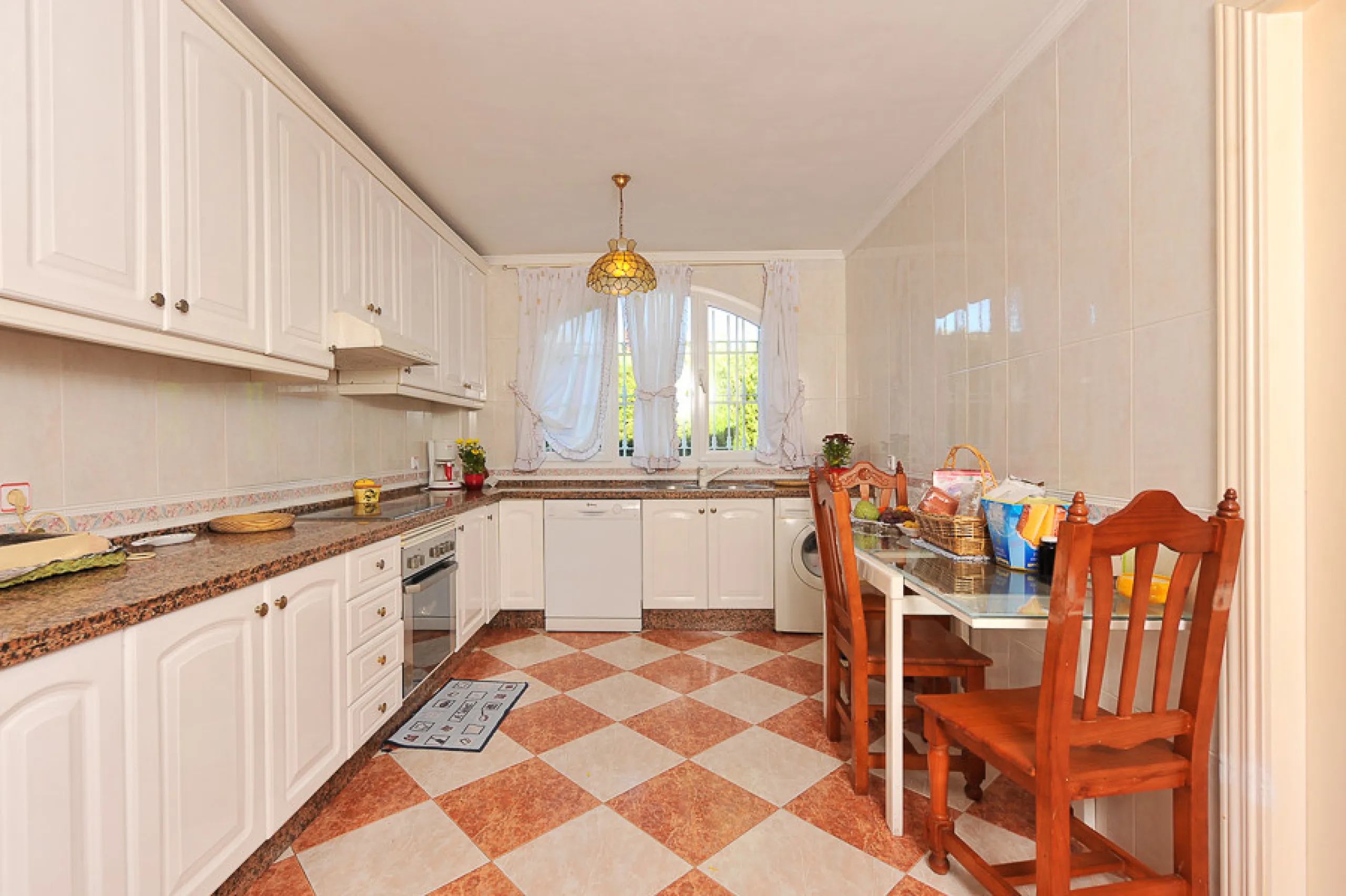 Well presented 4 bedroom villa, with fitted kitchen, garage parking, private pool and garden.  South West facing with views of the Mountains and the sea from the sunny terraces.