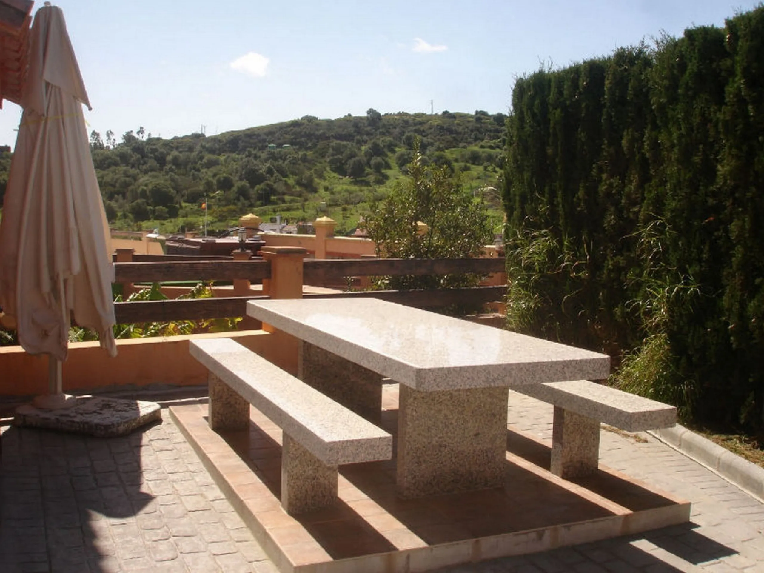 Private Estate of 4,250 m²** with a swimming pool, covered parking, sea-view lookout, barbecue oven, and terrace with views. The house spans 650 m² over three floors: equipped kitchen, living room, dining room for 10, study, suite with bathroom, 4 double 