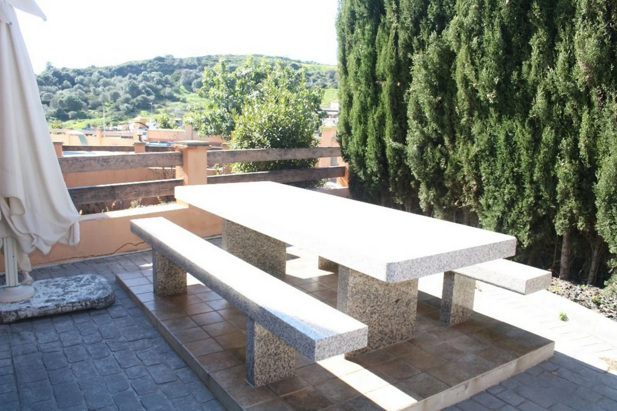 Private Estate of 4,250 m²** with a swimming pool, covered parking, sea-view lookout, barbecue oven, and terrace with views. The house spans 650 m² over three floors: equipped kitchen, living room, dining room for 10, study, suite with bathroom, 4 double 