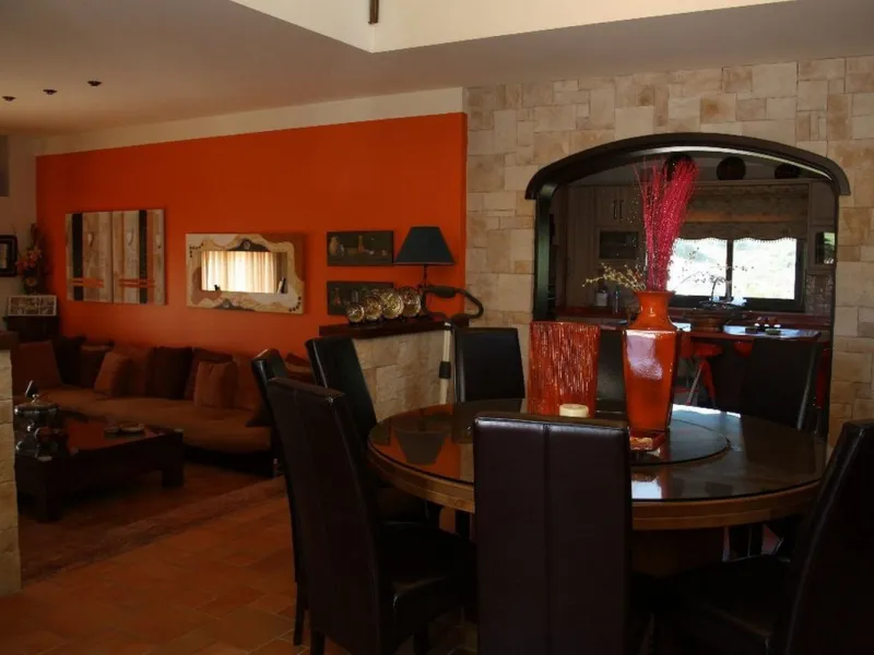 Private Estate of 4,250 m²** with a swimming pool, covered parking, sea-view lookout, barbecue oven, and terrace with views. The house spans 650 m² over three floors: equipped kitchen, living room, dining room for 10, study, suite with bathroom, 4 double 