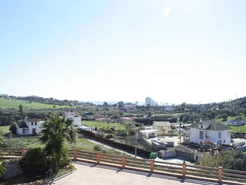 Private Estate of 4,250 m²** with a swimming pool, covered parking, sea-view lookout, barbecue oven, and terrace with views. The house spans 650 m² over three floors: equipped kitchen, living room, dining room for 10, study, suite with bathroom, 4 double 