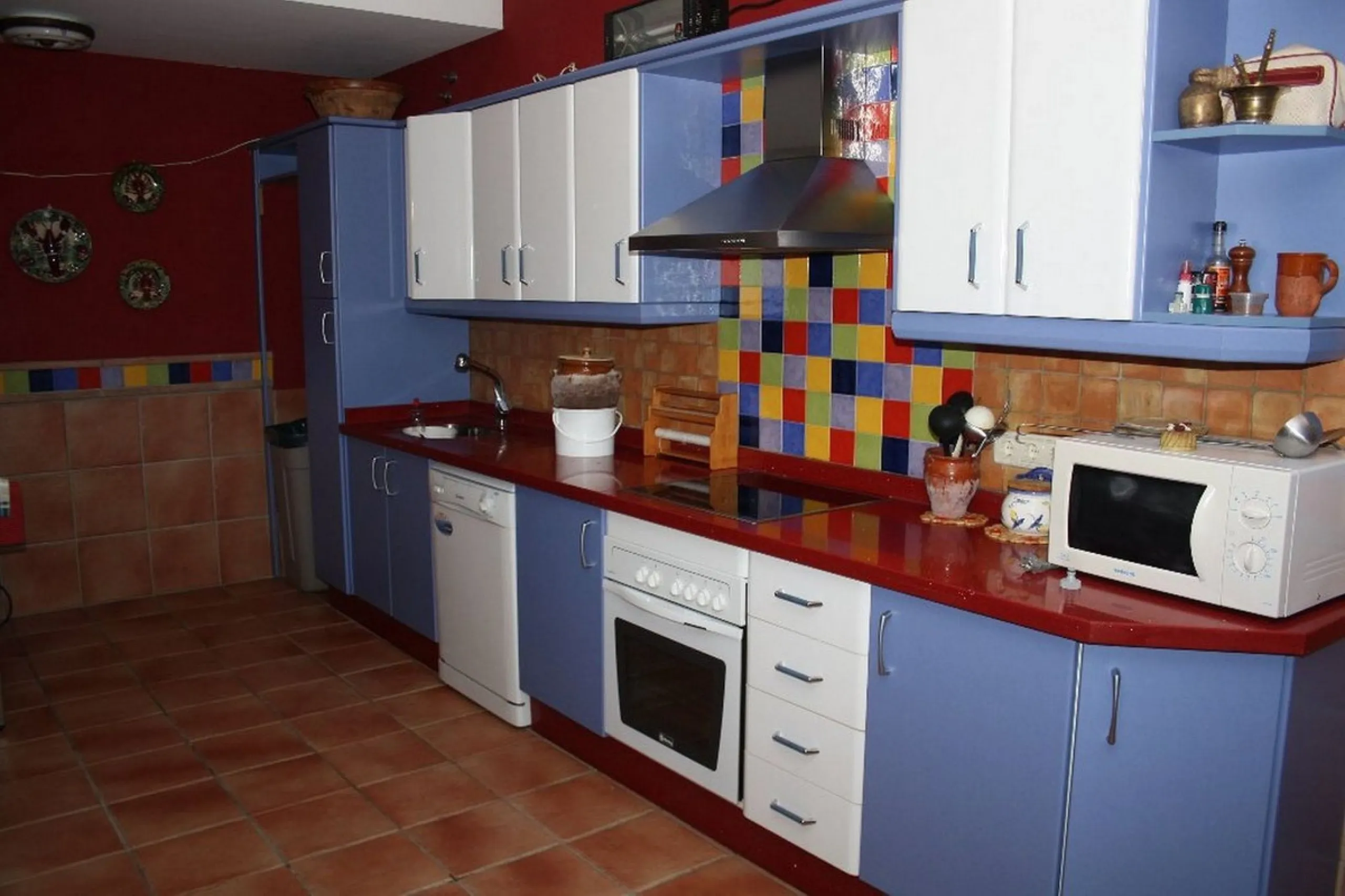 Private Estate of 4,250 m²** with a swimming pool, covered parking, sea-view lookout, barbecue oven, and terrace with views. The house spans 650 m² over three floors: equipped kitchen, living room, dining room for 10, study, suite with bathroom, 4 double 