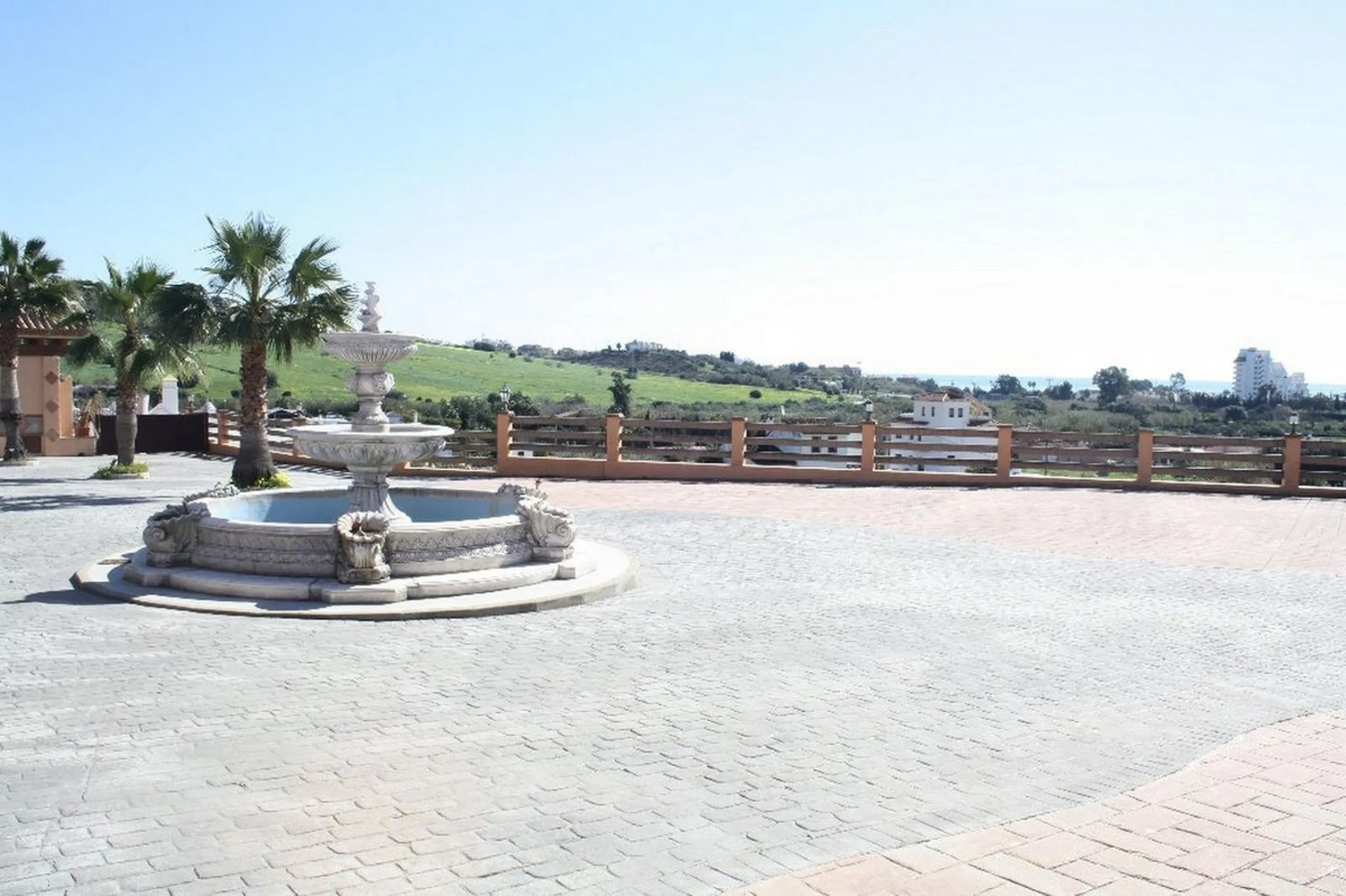 Private Estate of 4,250 m²** with a swimming pool, covered parking, sea-view lookout, barbecue oven, and terrace with views. The house spans 650 m² over three floors: equipped kitchen, living room, dining room for 10, study, suite with bathroom, 4 double 