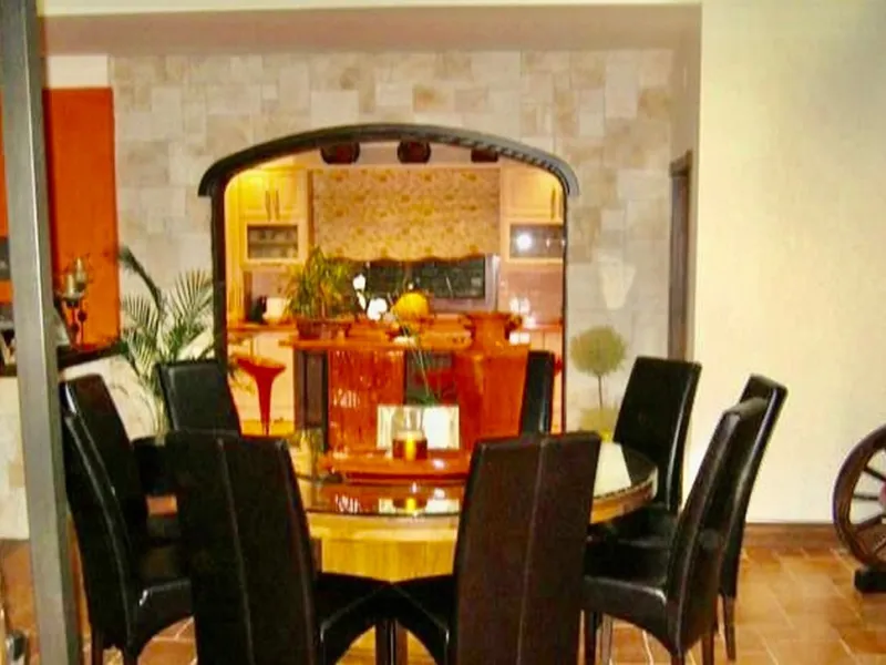 Private Estate of 4,250 m²** with a swimming pool, covered parking, sea-view lookout, barbecue oven, and terrace with views. The house spans 650 m² over three floors: equipped kitchen, living room, dining room for 10, study, suite with bathroom, 4 double 