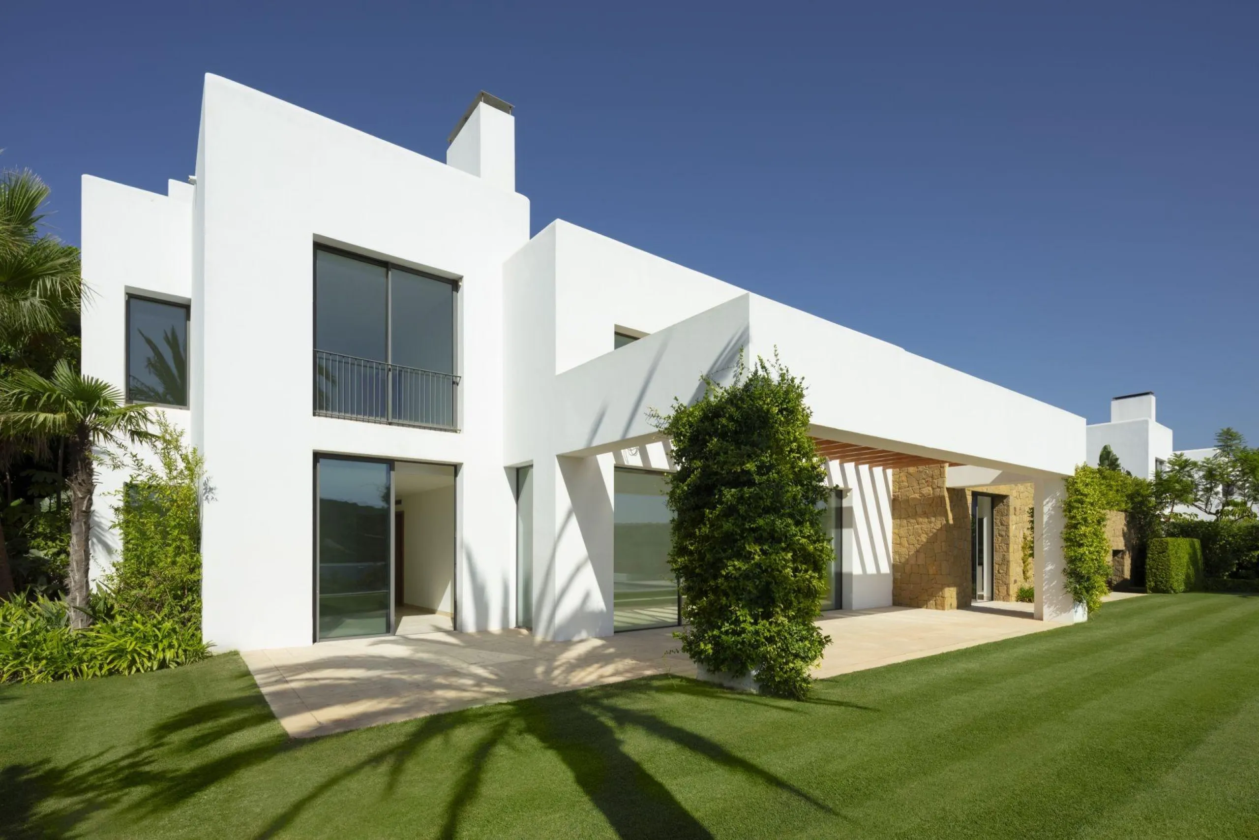 NEW BUILD EXCLUSIVE LUXURY VILLA AT FINCA CORTESÍN, CASARES& & Nestled within the enclave in the Finca Cortesin resort, this New Build villa exudes the charm of Ibiza-style residences. & The white structure, adorned with traditional Mediterranean