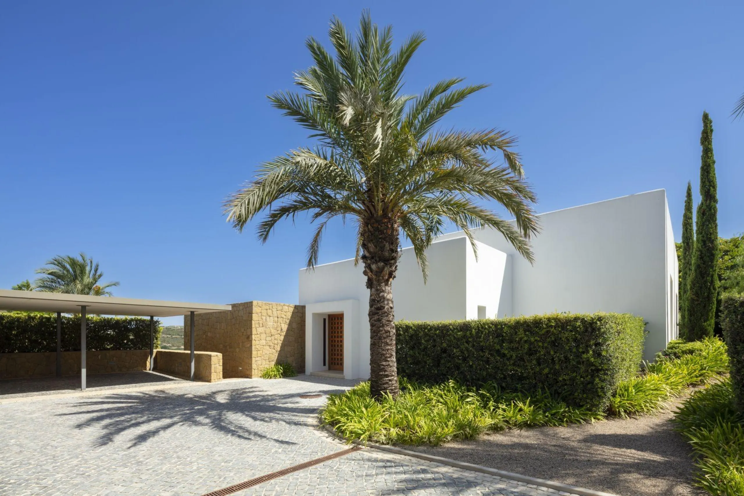 NEW BUILD EXCLUSIVE LUXURY VILLA AT FINCA CORTESÍN, CASARES& & Nestled within the enclave in the Finca Cortesin resort, this New Build villa exudes the charm of Ibiza-style residences. & The white structure, adorned with traditional Mediterranean