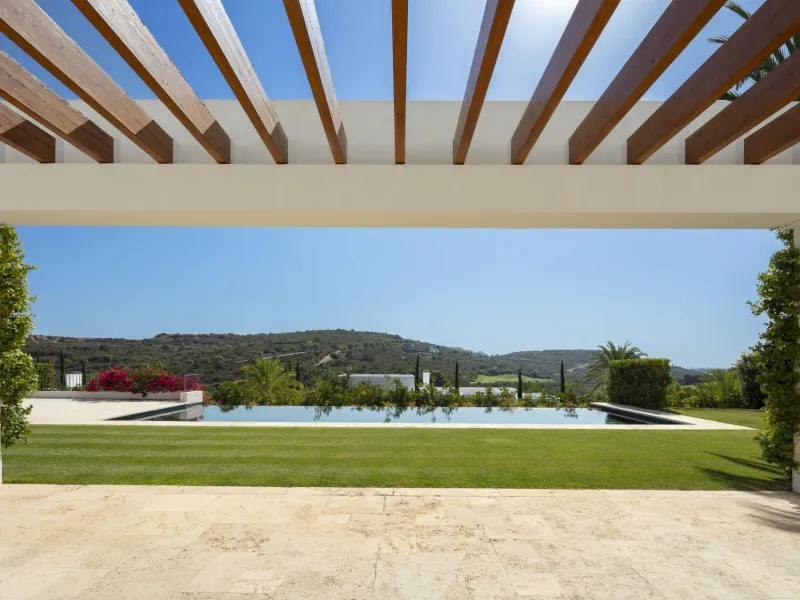 NEW BUILD EXCLUSIVE LUXURY VILLA AT FINCA CORTESÍN, CASARES& & Nestled within the enclave in the Finca Cortesin resort, this New Build villa exudes the charm of Ibiza-style residences. & The white structure, adorned with traditional Mediterranean