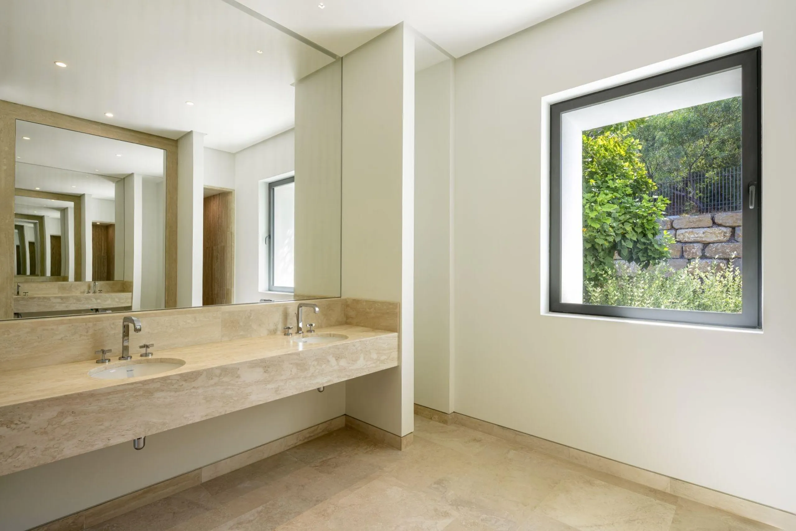 NEW BUILD EXCLUSIVE LUXURY VILLA AT FINCA CORTESÍN, CASARES& & Nestled within the enclave in the Finca Cortesin resort, this New Build villa exudes the charm of Ibiza-style residences. & The white structure, adorned with traditional Mediterranean