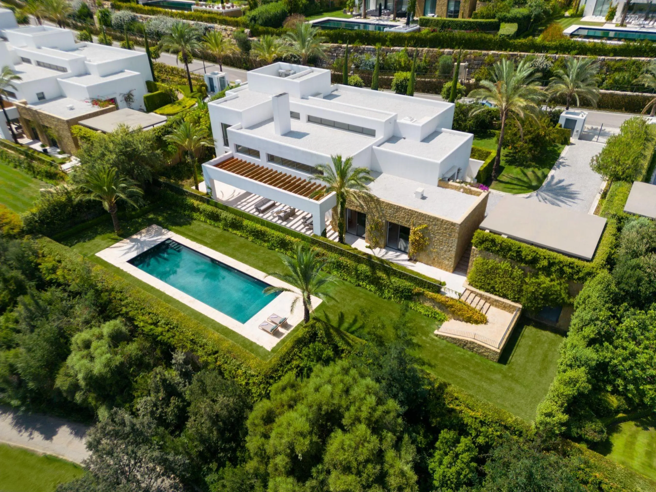NEW BUILD EXCLUSIVE LUXURY VILLA AT FINCA CORTESÍN, CASARES& & Nestled within the enclave in the Finca Cortesin resort, this New Build villa exudes the charm of Ibiza-style residences. & The white structure, adorned with traditional Mediterranean