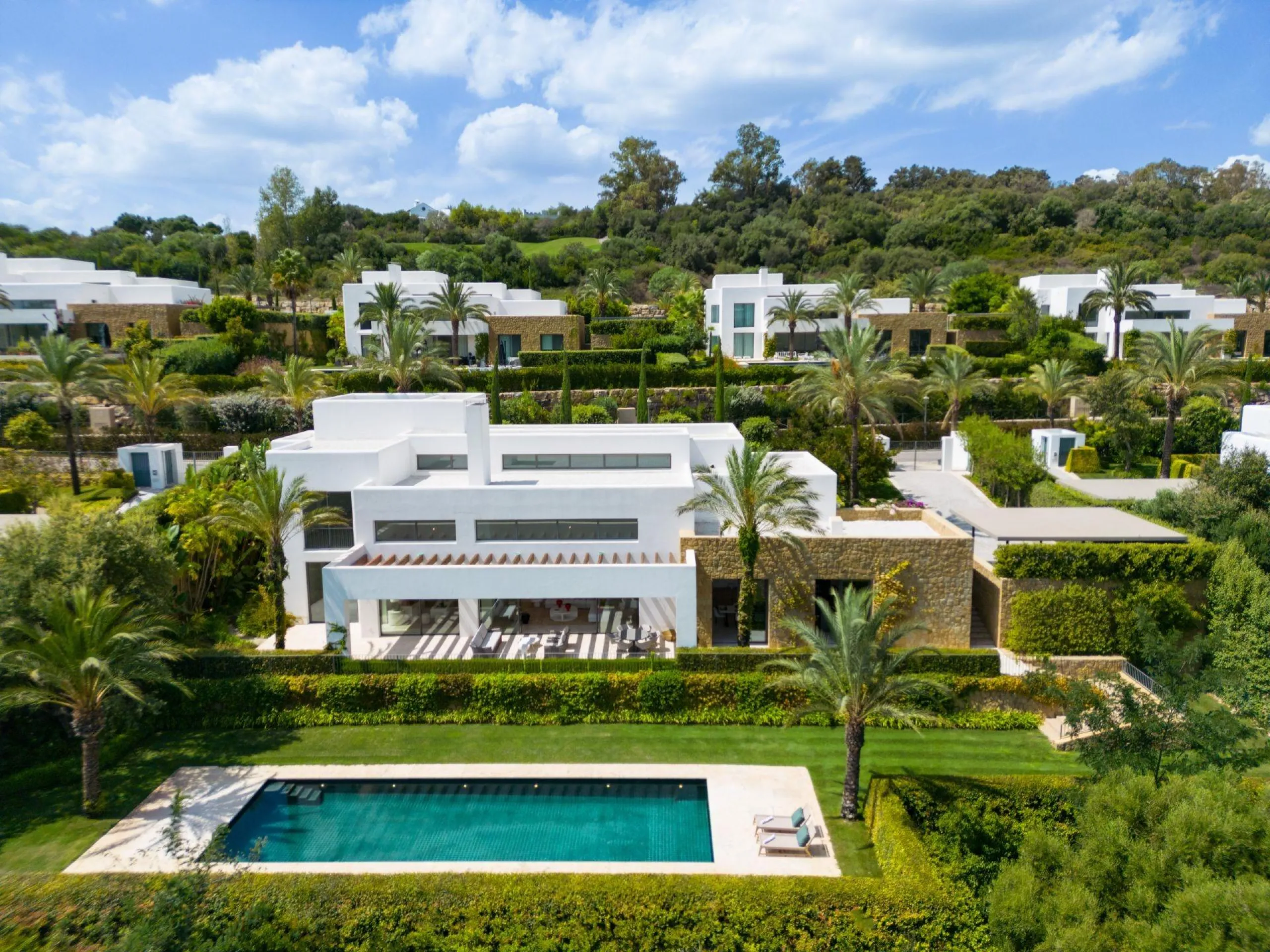 NEW BUILD EXCLUSIVE LUXURY VILLA AT FINCA CORTESÍN, CASARES& & Nestled within the enclave in the Finca Cortesin resort, this New Build villa exudes the charm of Ibiza-style residences. & The white structure, adorned with traditional Mediterranean