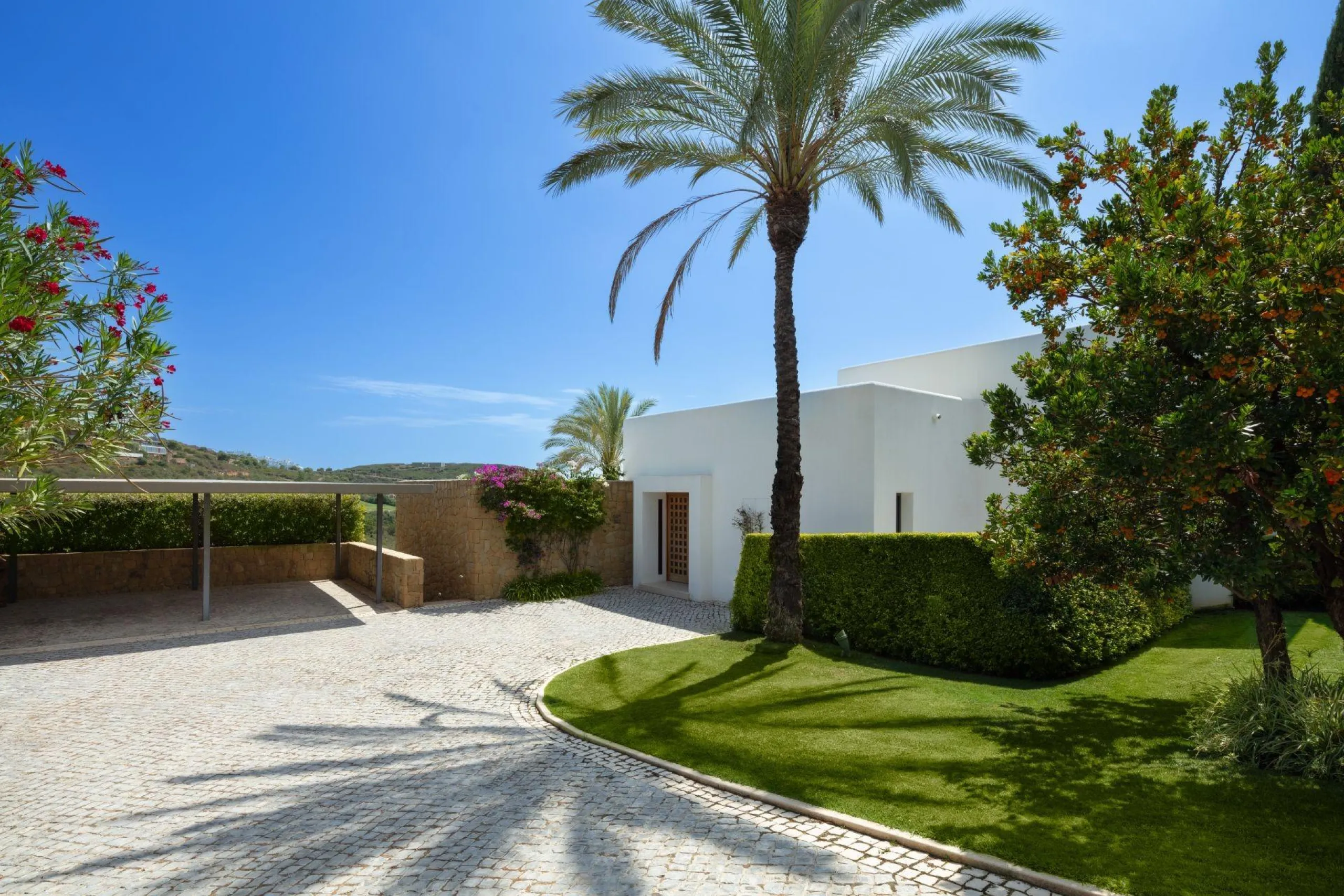 NEW BUILD EXCLUSIVE LUXURY VILLA AT FINCA CORTESÍN, CASARES& & Nestled within the enclave in the Finca Cortesin resort, this New Build villa exudes the charm of Ibiza-style residences. & The white structure, adorned with traditional Mediterranean