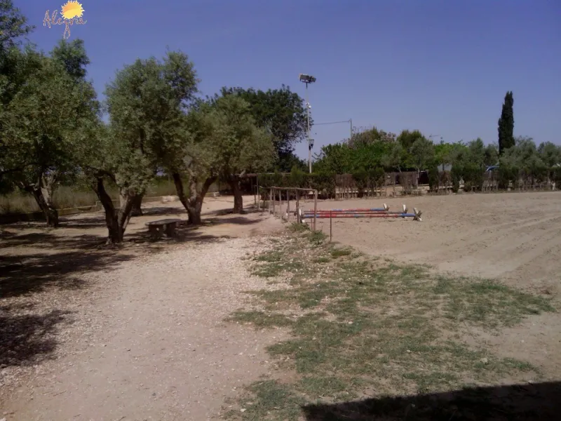 FAMOUS RIDING CENTER WITH INDEPENDENT RURAL HOUSE