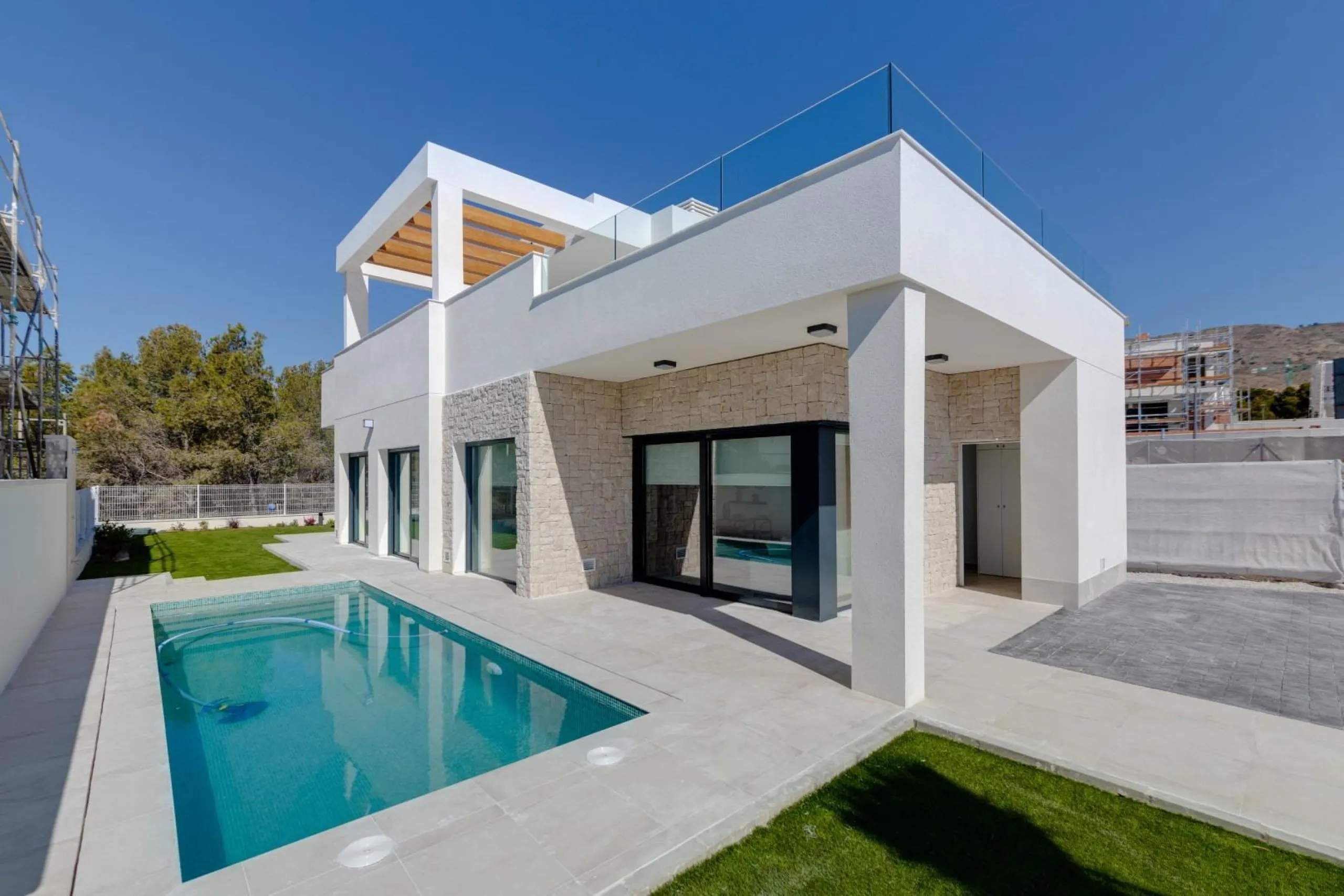 Luxury villas surrounded by green areas and golf courses