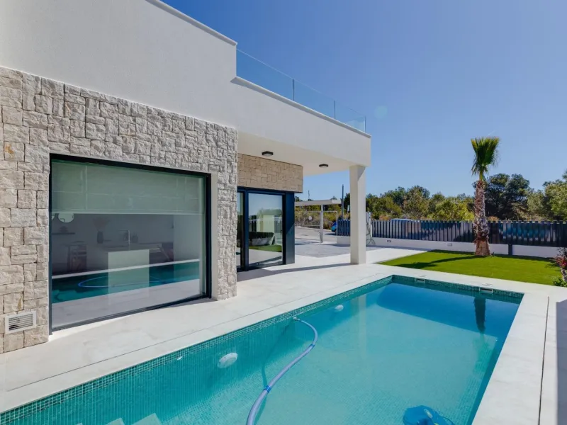 Luxury villas surrounded by green areas and golf courses
