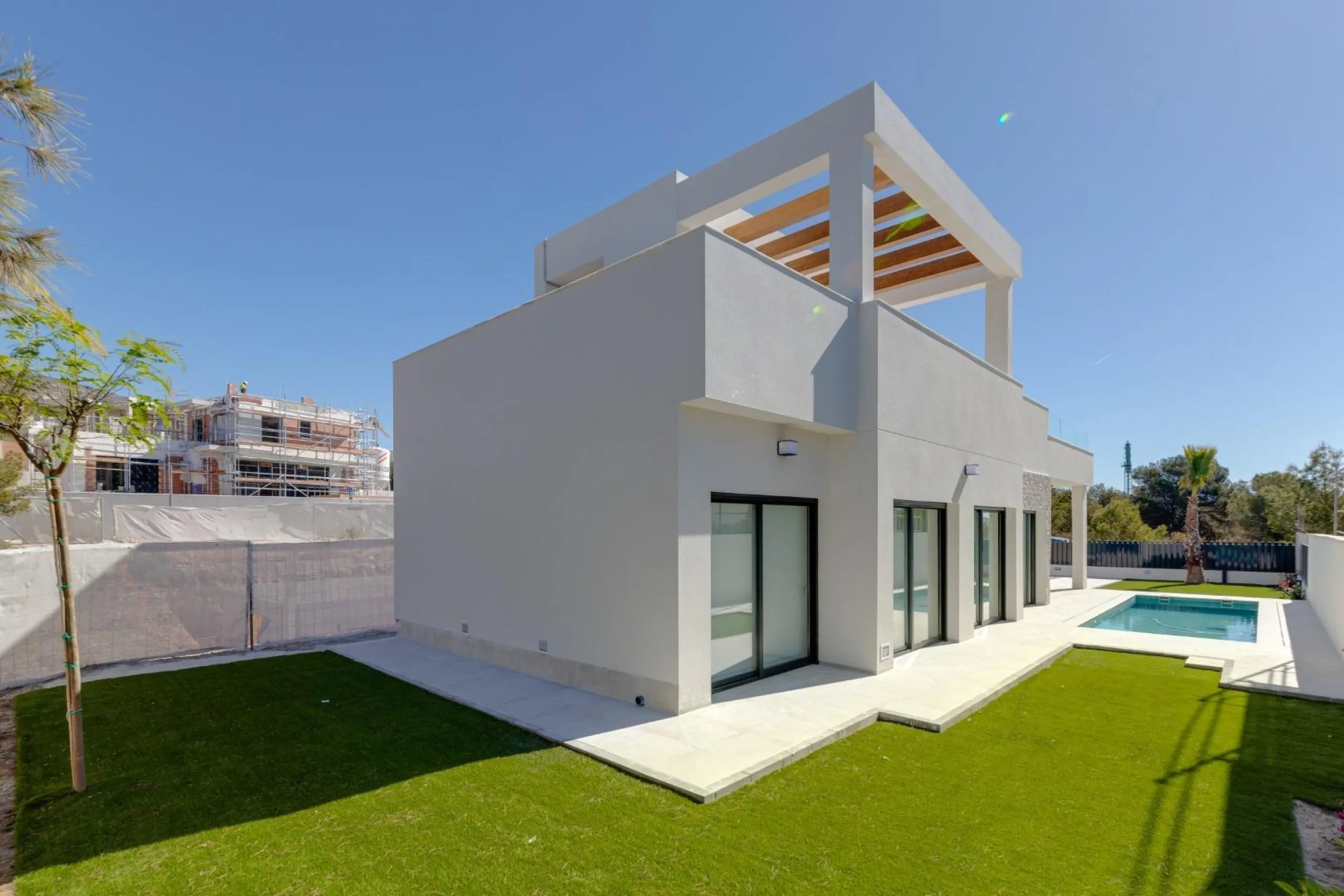 Luxury villas surrounded by green areas and golf courses