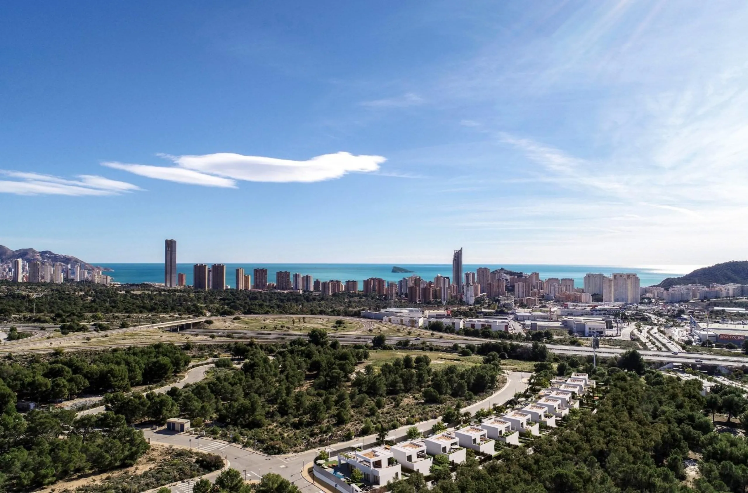 Luxury villas surrounded by green areas and golf courses