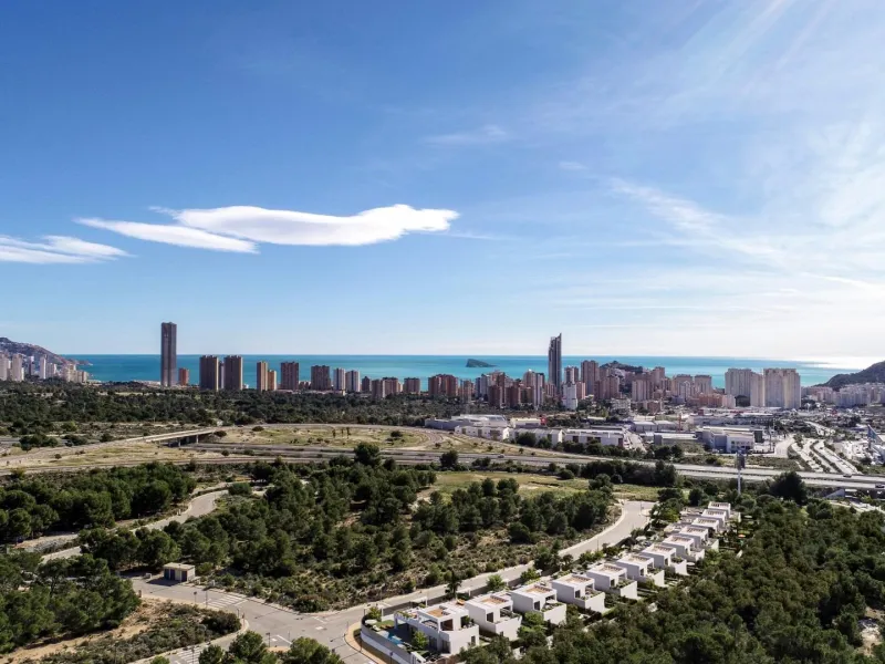 Luxury villas surrounded by green areas and golf courses