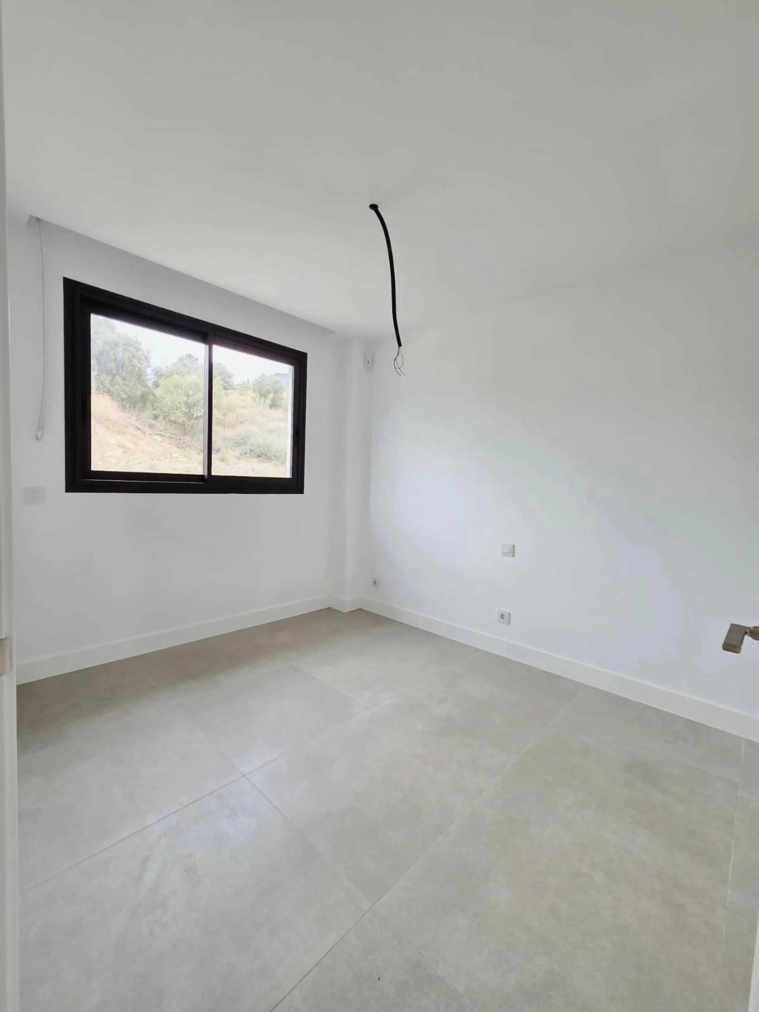 Exklusives mediterranes Wohnen in dieser unbenutzten, nach Süden ausgerichteten Wohnung in der begehrten Phase Las Lomas 5 von La Reserva del Higuerón