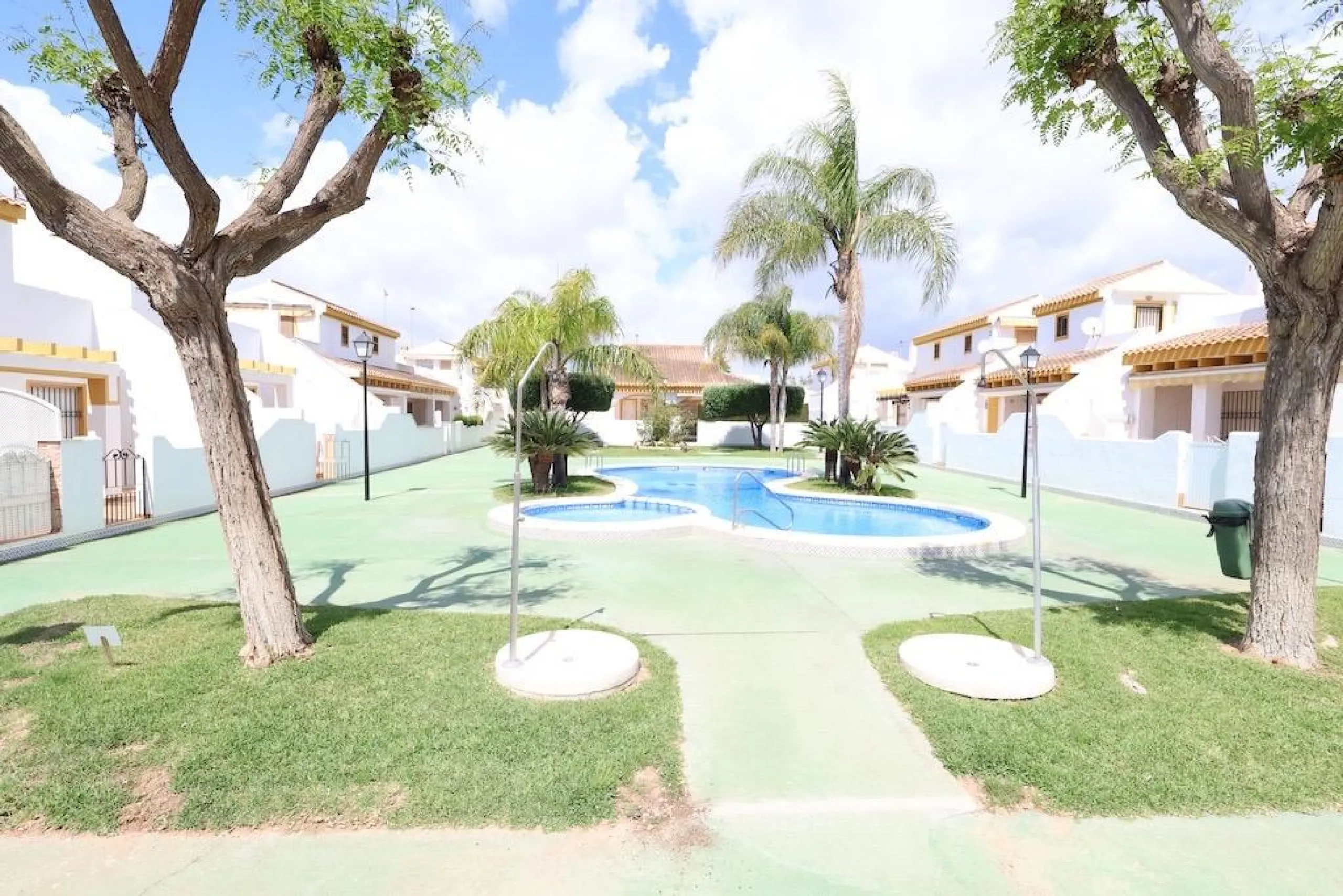 Torre de la Horadada duplex townhouse located directly in front of the communal pool