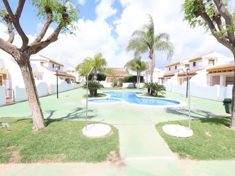 Torre de la Horadada duplex townhouse located directly in front of the communal pool